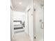 Hallway view looking to the bedroom with a glass shower on the right at 3915 Wesvan Ct, Las Vegas, NV 89121