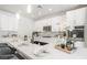 Modern kitchen featuring white cabinets, stainless steel appliances, and a spacious island at 3915 Wesvan Ct, Las Vegas, NV 89121
