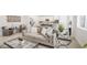 Contemporary living area featuring an open layout, stylish furniture, and an inviting atmosphere at 3915 Wesvan Ct, Las Vegas, NV 89121