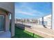 Green backyard with artificial turf, fencing, and mountain views at 4014 Sparrow Rock St, Las Vegas, NV 89129