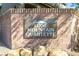 Stone entrance sign for Lone Mountain Quartette community at 4014 Sparrow Rock St, Las Vegas, NV 89129