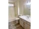 Standard bathroom featuring a shower-tub combo, toilet, and single sink vanity at 4356 Pittsfield St, Las Vegas, NV 89115