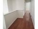 Hallway with wood laminate floor at 4356 Pittsfield St, Las Vegas, NV 89115