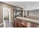 Open hallway features wood floors, natural lighting, and study room access at 4573 Milvio Ave, Las Vegas, NV 89141