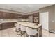 Gourmet kitchen features a center island, granite countertops, and updated appliances at 4573 Milvio Ave, Las Vegas, NV 89141