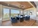 This office features wood floors, custom shelves and cabinets, and a large window overlooking a backyard at 4574 Fiore Bella Blvd, Las Vegas, NV 89135