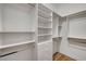 Well-organized walk-in closet featuring shelving, drawers, and ample storage space at 4574 Fiore Bella Blvd, Las Vegas, NV 89135