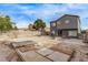 Large backyard with a patio, space for seating, and potential for personalized landscaping at 4919 Rancho Domingo Ct, North Las Vegas, NV 89031