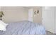 Bedroom with neutral-toned walls and carpet, along with white trim and doors at 4992 W Moberly Ave, Las Vegas, NV 89139