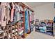 Spacious walk-in closet with custom shelving and storage for shoes, clothing, and accessories at 4992 W Moberly Ave, Las Vegas, NV 89139