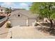 This home has a three car garage and low maintenance desert landscaping at 51 La Fiesta St, Henderson, NV 89012