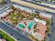 Aerial view showcasing pools, greenery, community buildings, and parking for residents at 5185 Indian River Dr # 229, Las Vegas, NV 89103