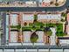 Aerial view of an apartment complex with well-maintained green spaces, covered parking, and a serene environment at 5185 Indian River Dr # 229, Las Vegas, NV 89103
