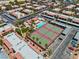 Community aerial view highlighting tennis courts, pool, landscaping, and nearby covered parking at 5185 Indian River Dr # 229, Las Vegas, NV 89103