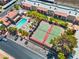 Birds eye view showing the tennis courts and swimming pool at 5185 Indian River Dr # 229, Las Vegas, NV 89103