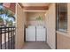 Balcony offers exterior laundry closet including a full size washer and dryer and a view of surrounding community at 5185 Indian River Dr # 229, Las Vegas, NV 89103