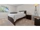 Comfortable bedroom with neutral tones, natural light, and stylish furnishings creating a serene retreat at 5185 Indian River Dr # 229, Las Vegas, NV 89103