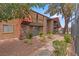 Exterior angle of the stone accented building with well maintained landscape at 5185 Indian River Dr # 229, Las Vegas, NV 89103
