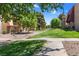 Attractive community grounds featuring mature trees and grassy areas, ideal for relaxing walks at 5185 Indian River Dr # 229, Las Vegas, NV 89103