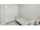 A small bonus bedroom with lots of closet space, natural light, and plank flooring at 5220 Remini Ct, Las Vegas, NV 89130