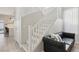 Open living space with staircase, modern decor, and access to the backyard at 5220 Remini Ct, Las Vegas, NV 89130