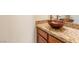 Bathroom vanity features a granite countertop and an artistic glass bowl sink at 5329 La Patera Ln, Las Vegas, NV 89149