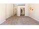 Bright bedroom with sliding door closet and view of two entryways at 5329 La Patera Ln, Las Vegas, NV 89149