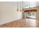 The living room has tile flooring and features a sliding glass door with backyard view at 5329 La Patera Ln, Las Vegas, NV 89149