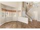 Spacious living room features soaring ceilings, large windows, and neutral decor, creating a bright and welcoming atmosphere at 5329 La Patera Ln, Las Vegas, NV 89149