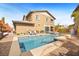Private backyard oasis features a pool and spa, and patio area, perfect for relaxation and outdoor entertaining at 5523 Kyle Peak Ct, Las Vegas, NV 89135