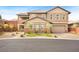 Well-manicured two-story home with low maintenance landscaping on a cul-de-sac at 5523 Kyle Peak Ct, Las Vegas, NV 89135