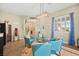 Cozy sitting area with modern lighting, cheerful decor, and a view of the staircase at 5523 Kyle Peak Ct, Las Vegas, NV 89135