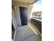 An inviting outdoor space with a private balcony and storage, offering a serene retreat and added functionality at 555 E Silverado Ranch Blvd # 1069, Las Vegas, NV 89183