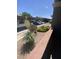 Inviting patio with mature landscaping and covered parking nearby adds appeal at 555 E Silverado Ranch Blvd # 1069, Las Vegas, NV 89183