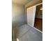 The screened sliding door leads to the bright interior of this unit at 555 E Silverado Ranch Blvd # 1069, Las Vegas, NV 89183