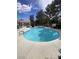 A well-kept community pool with clear water is surrounded by plenty of space for residents to relax at 555 E Silverado Ranch Blvd # 1069, Las Vegas, NV 89183