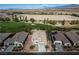 Aerial view showcasing the house, landscaping, and the surrounding neighborhood at 5618 E San Marco Dr, Pahrump, NV 89061