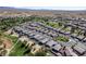 Aerial view showcases a well-planned community, situated near a lush golf course and desert landscape at 5618 E San Marco Dr, Pahrump, NV 89061