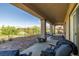 Relaxing back patio with an overhead, beautiful mountain view and seating at 5618 E San Marco Dr, Pahrump, NV 89061