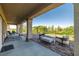 Relaxing back patio with an overhead, beautiful view of the open space and seating at 5618 E San Marco Dr, Pahrump, NV 89061