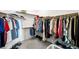 Walk-in closet with ample storage space, hanging rods, and shelving at 5618 E San Marco Dr, Pahrump, NV 89061