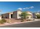 Inviting single-story home featuring desert landscaping, a charming entryway, and an attached two-car garage at 5618 E San Marco Dr, Pahrump, NV 89061