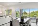 Open living and dining area with outdoor views, modern décor, and seamless indoor-outdoor flow for entertaining at 5618 E San Marco Dr, Pahrump, NV 89061