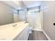 Clean bathroom featuring a vanity, mirror, and walk-in shower at 5720 Ruby Creek Dr, Las Vegas, NV 89142
