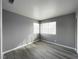 Well-lit bedroom features modern flooring and neutral walls at 5720 Ruby Creek Dr, Las Vegas, NV 89142