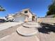 Two-story home with a two car garage and drought resistant landscaping at 5720 Ruby Creek Dr, Las Vegas, NV 89142