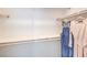 A well-organized walk-in closet providing ample space for clothing and accessories at 6112 Aster Garden St # 131, North Las Vegas, NV 89081