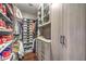 Well-organized walk-in closet with shelves for clothes, shoes, and accessories at 62 Grand Masters Dr, Las Vegas, NV 89141