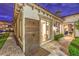 Charming exterior with wooden shower, landscaped yard, and convenient access to outdoor amenities at 62 Grand Masters Dr, Las Vegas, NV 89141