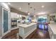 Gourmet kitchen with a center island, modern appliances, and easy access to outdoor dining at 62 Grand Masters Dr, Las Vegas, NV 89141